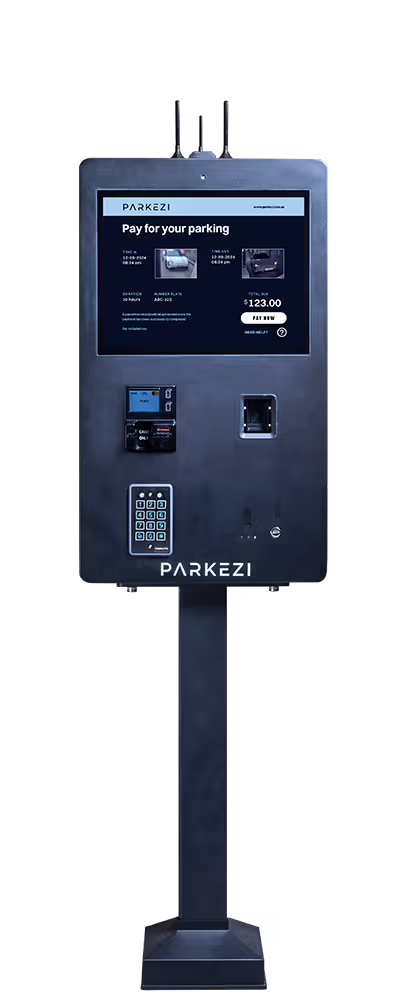 A parking payment machine with a screen, keypad, card slot, and instructions for use.